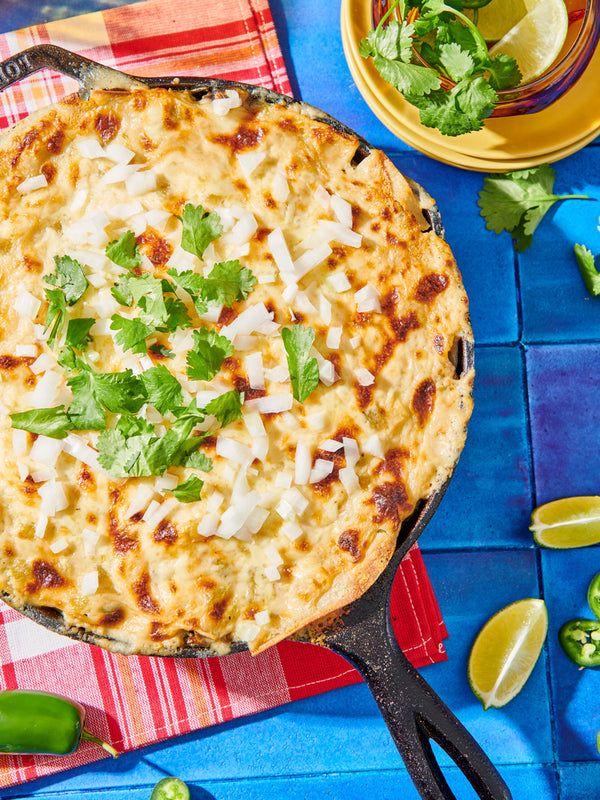 Skillet Layered Enchiladas with Chicken, Mushrooms, and Spinach